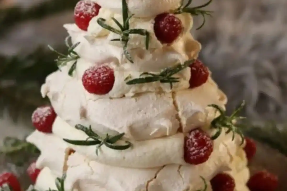Festive Pavlova Christmas Tree with berries and whipped cream
